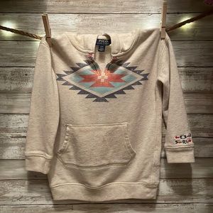 Cream hoodie with tribal print on front signature